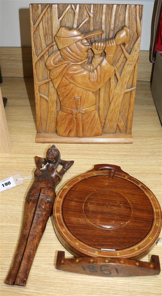 A figural carving novelty nutcrackers and inlaid cake stand.